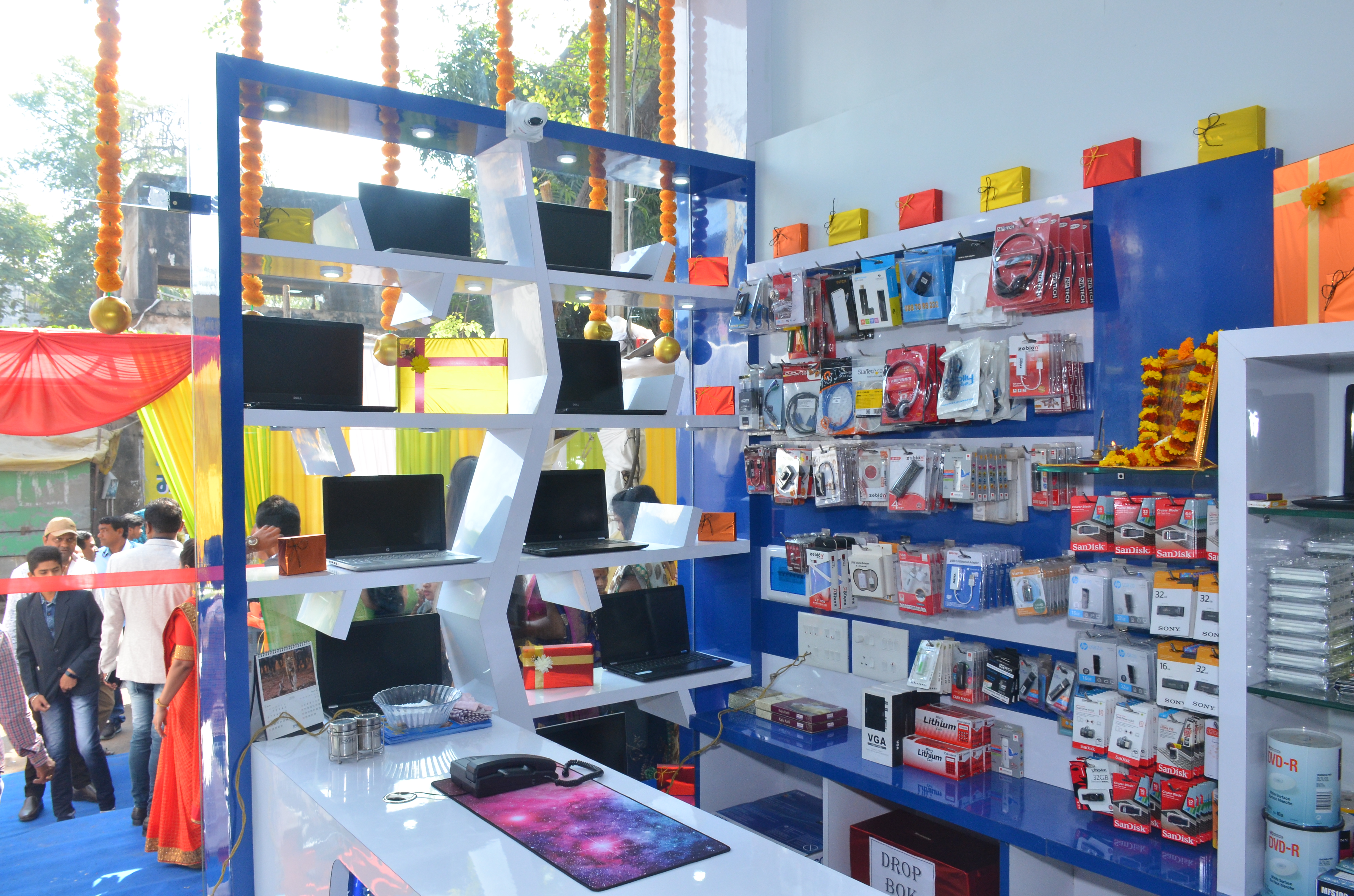 Store interior showing service counter and product displays — Laxmi Computer Service, Chandrapur